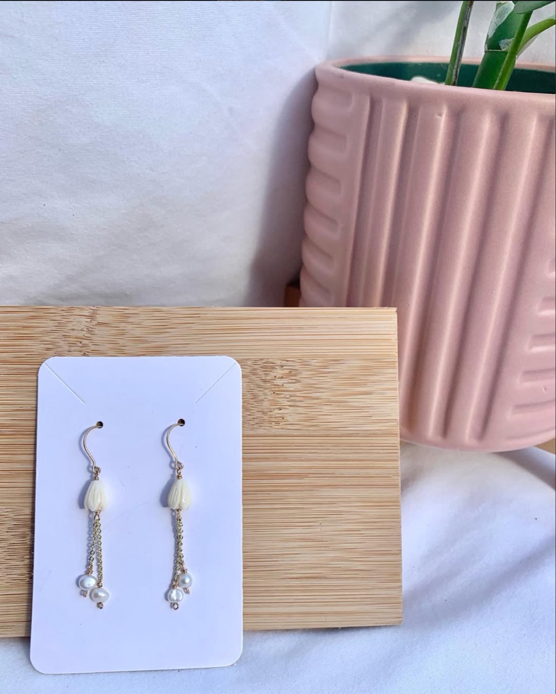 Cowrie and pearl dangles